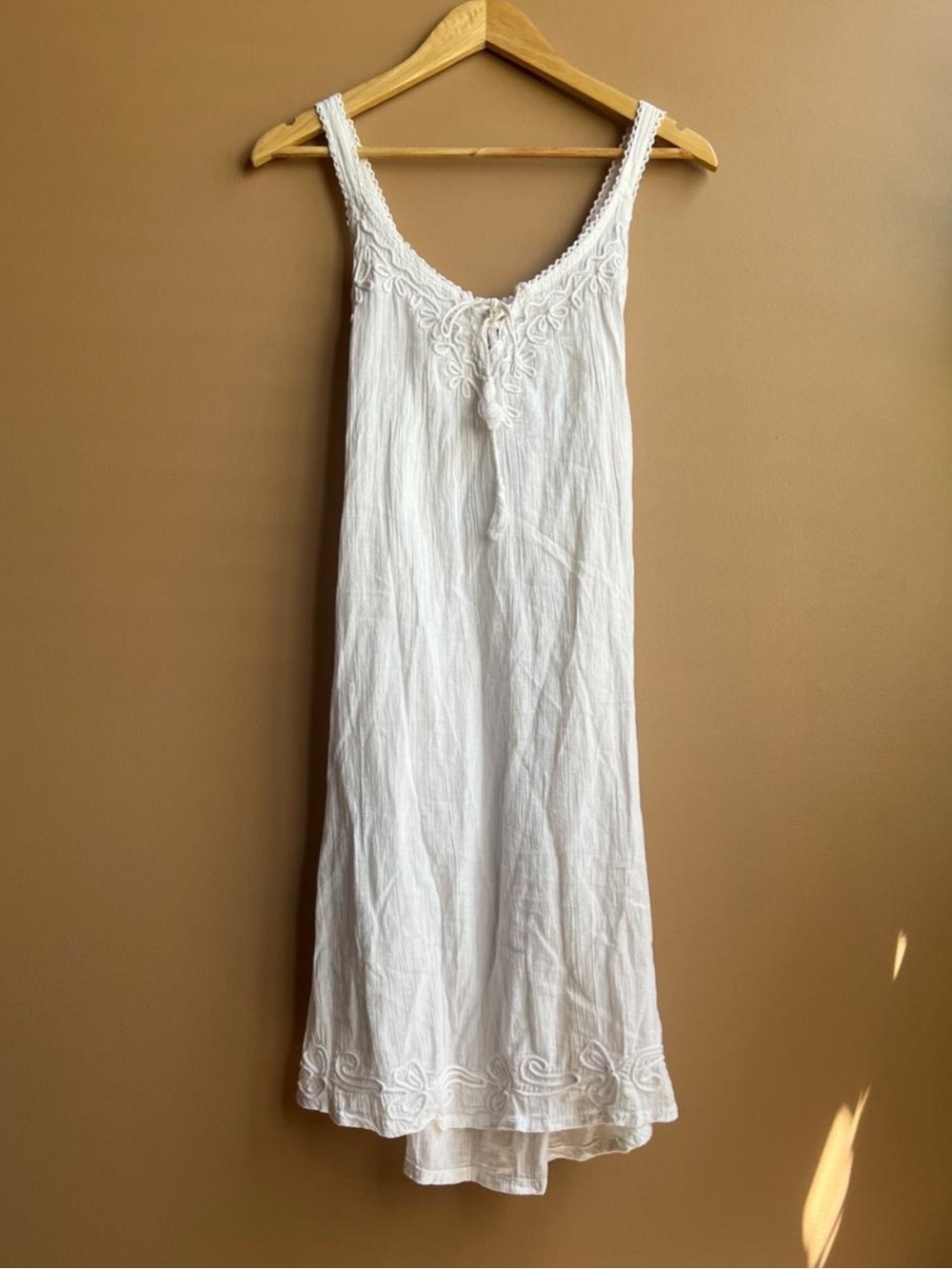 India Boutique White Embroidered Cotton Slip with tie front. One size fits most.